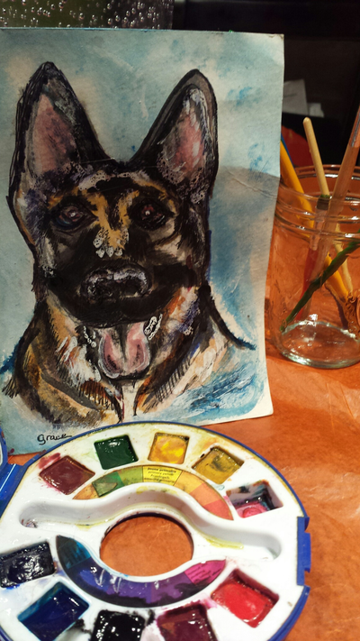 dog painting on easel